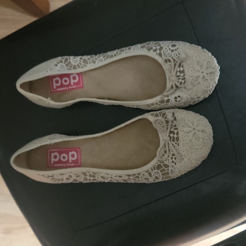 Cream color flats. Practically brand new.